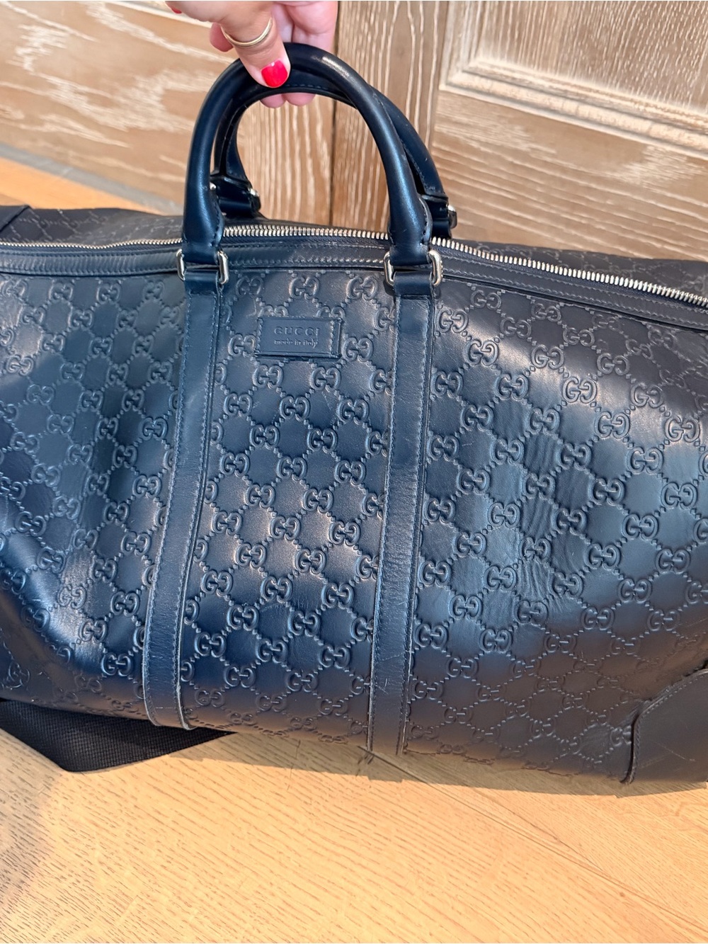 Gucci Navy Embossed GG Leather Duffel Bag
